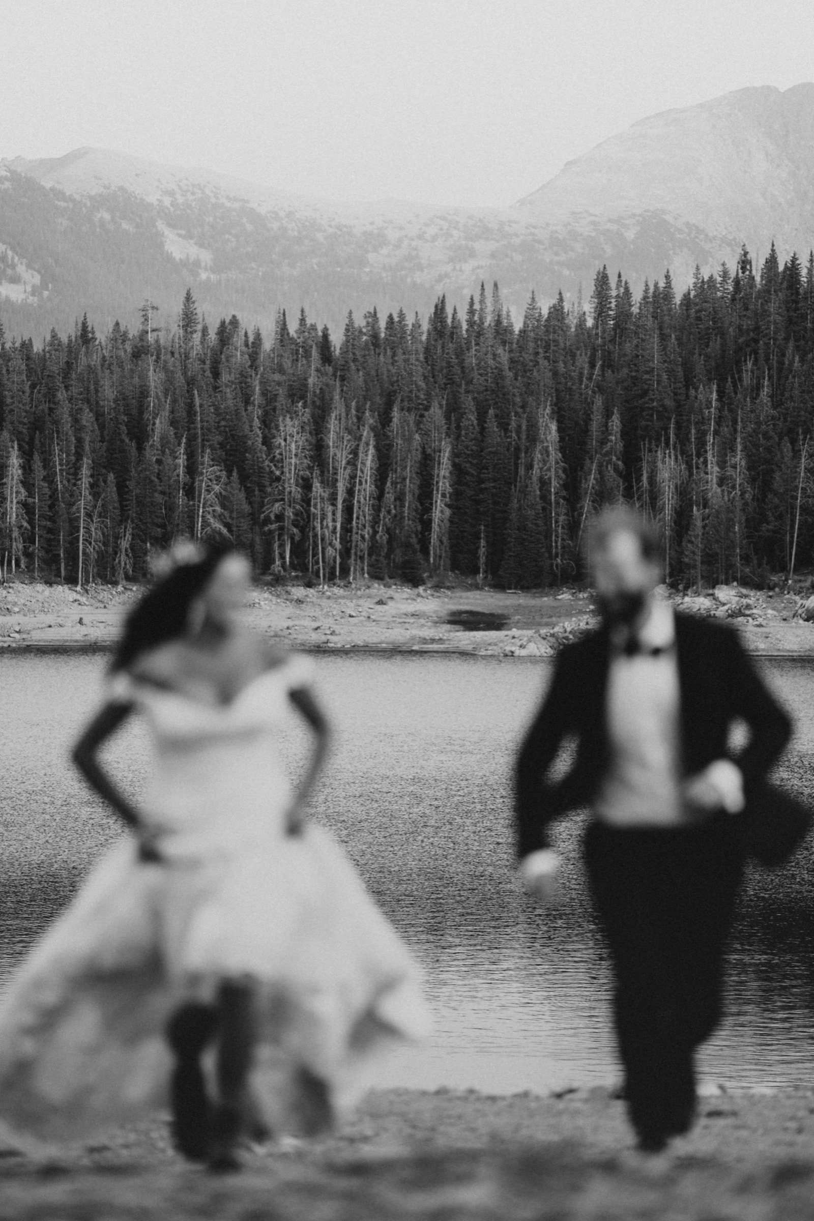 Candid wedding moment from Sam and Savanna's mountain wedding in Winter Park, Colorado