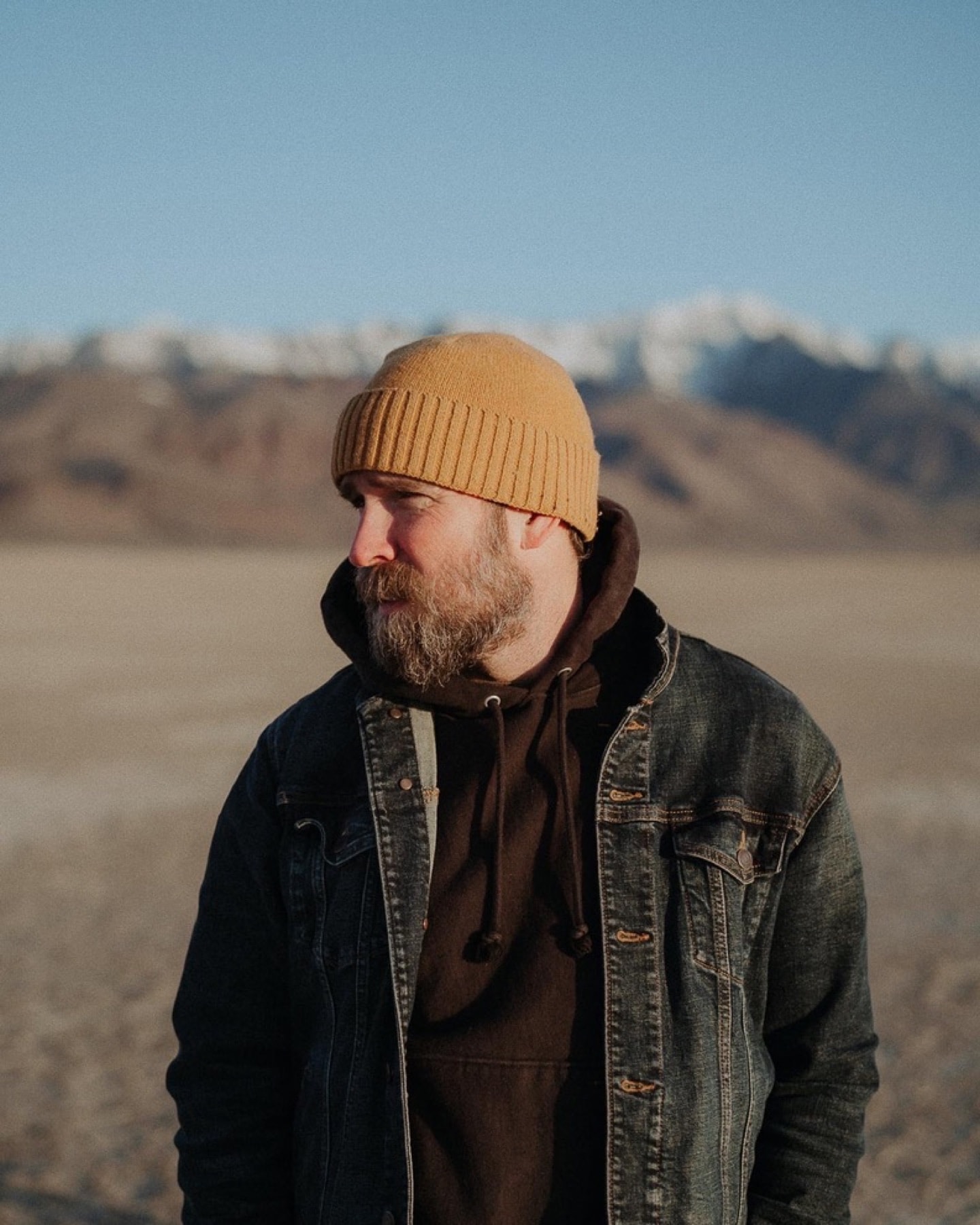 Mark Gowen portrait in a hat and denim jacket